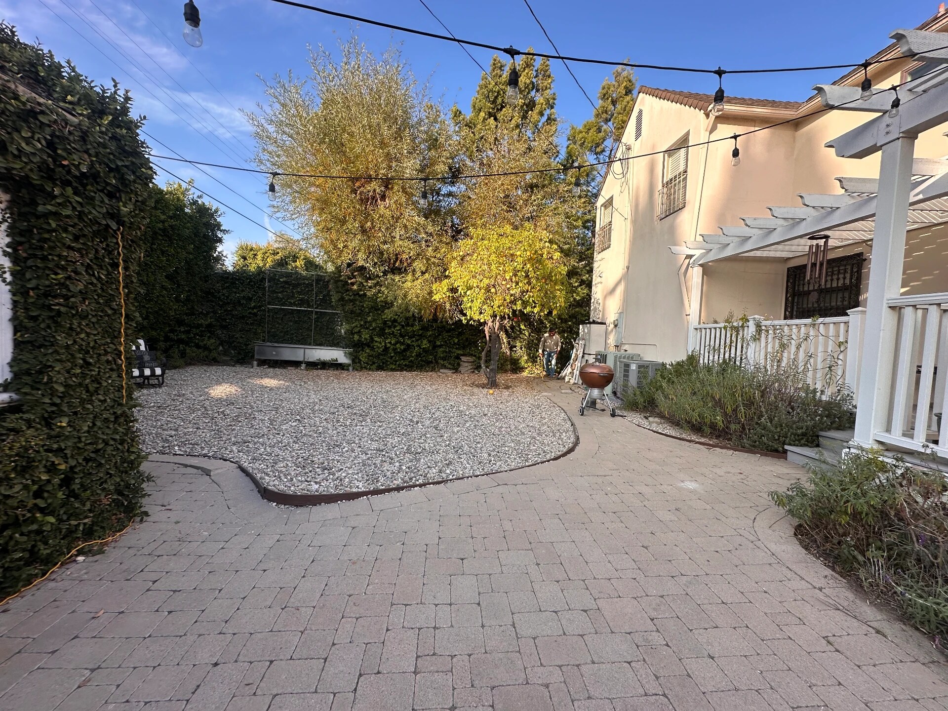 Gravel yard before the Mediterranean drought-tolerant redesign, view 2